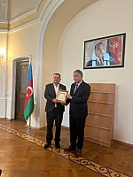 TÜRKSOY Yunus Oğuza Onur nişanı verdi-