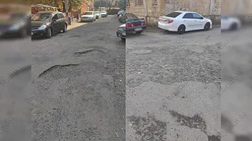 Uşaqlar palçıq içində məktəbə gedir: 